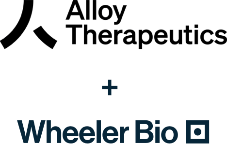 Alloy Therapeutics and Wheeler Bio logos with a 'plus' sign between them, indicating the two companies' partnership at the Boston Research and Development center for biologics and more