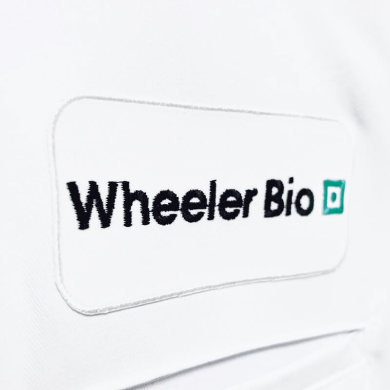 Photo of a Wheeler Logo on some company uniform