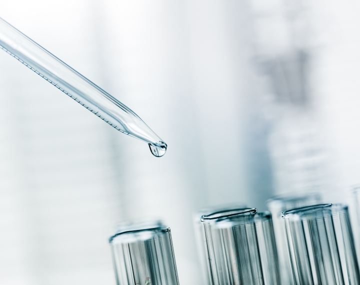 Image of a syringe dropping fluid into tubes, reflecting Wheeler's cell line and analytical method development services